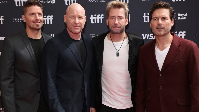 Nickelback posing for a photo at the 2023 Toronto International Film Festival